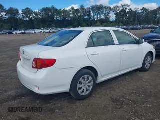 2009 Toyota Corolla with VIN JTDBL40E199019510, listed as a IAAI auction lot 40471286 with 99,818 mi miles and . Bid and sale history available at carsss.com. Image 4.