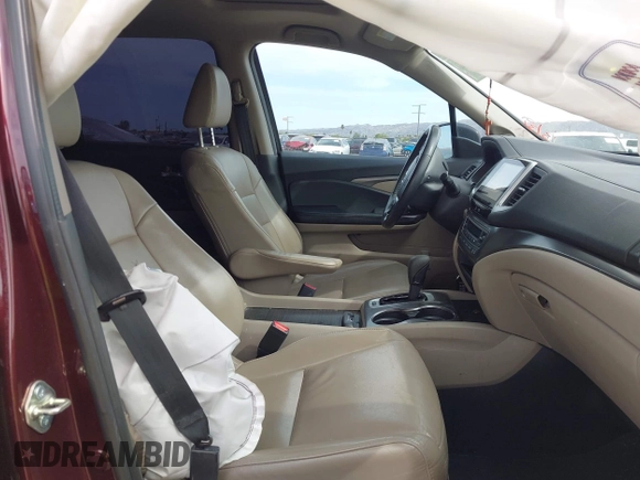 2016 Honda Pilot EX-L with VIN 5FNYF5H57GB028307, listed as a IAAI auction lot 41925711 with 125,118 mi miles and . Bid and sale history available at DreamBid. Image 5.