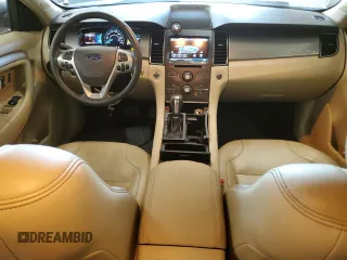 2015 Ford Taurus SEL with VIN 1FAHP2E84FG102318, listed as a Copart auction lot 61744685 with 82,149 mi miles and Salvage title. Bid and sale history available at DreamBid. Image 8.