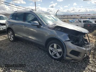 2014 Volkswagen Touareg Lux z VIN WVGEF9BP1ED007974, wystawiony jako Copart lot #82627834 z przebiegiem Nie podano mil oraz Szkoda całkowita • Salvage title. Historia ofert i sprzedaży dostępna na DreamBid. Obrazek 4.
