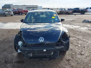 2018 Volkswagen Beetle S with VIN 3VWFD7ATXJM706338, listed as a IAAI auction lot 41293181 with 71,945 mi miles. Bid and sale history available at carsss.com. Image 13.