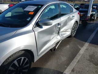 2018 Nissan Altima 2.5 SV with VIN 1N4AL3APXJC265944, listed as a IAAI auction lot 41052902 with 142,023 mi miles. Bid and sale history available at carsss.com. Image 6.