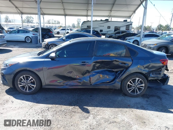2023 Kia Forte LXS with VIN 3KPF24AD6PE648764, listed as a IAAI auction lot 41866394 with 26,341 mi miles and . Bid and sale history available at DreamBid. Image 6.