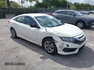 2016 Honda Civic Sedan LX with VIN 19XFC2F59GE068847, listed as a IAAI auction lot 42051510 with 113,450 mi miles. Bid and sale history available at carsss.com. Image 1.