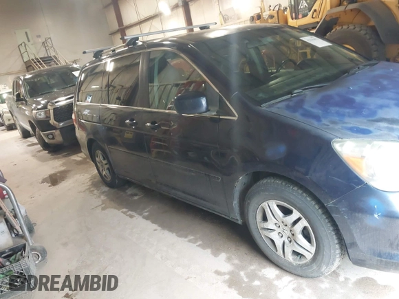 2007 Honda Odyssey EX-L z VIN 5FNRL386X7B014590, wystawiony jako IAAI lot #42339451 z przebiegiem 216 247 mil mil oraz . Historia ofert i sprzedaży dostępna na DreamBid. Obrazek 1.