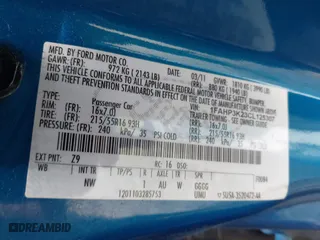 2012 Ford Focus SE with VIN 1FAHP3K23CL125307, listed as a IAAI auction lot 42056610 with 122,204 mi miles. Bid and sale history available at carsss.com. Image 9.