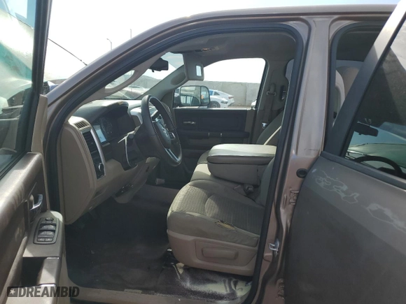 2010 Dodge Ram 1500 SLT with VIN 1D7RB1CP2AS141633, listed as a Copart auction lot 69499904 with 129,488 mi miles and Salvage Title. Bid and sale history available at carsss.com. Image 7.
