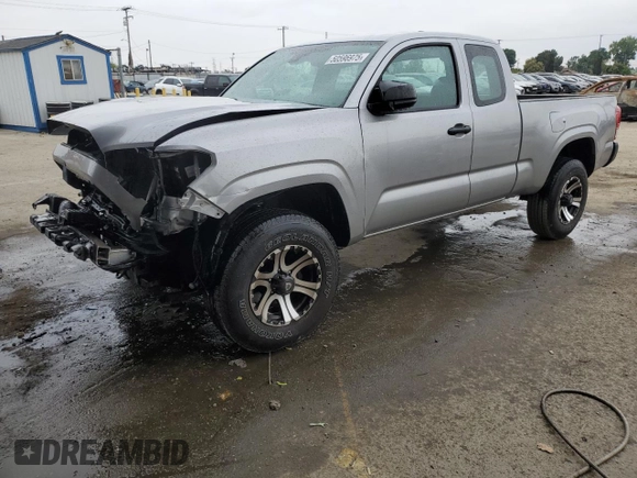 2018 Toyota Tacoma SR with VIN 5TFRX5GN1JX124112, listed as a Copart auction lot 50596975 with 57,587 mi miles and Salvage Title. Bid and sale history available at DreamBid. Image 1.