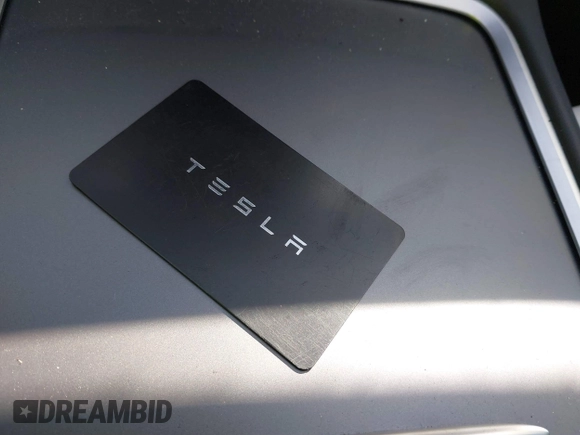 2023 Tesla Model Y Performance z VIN 7SAYGDEF6PF774965, wystawiony jako IAAI lot #41655550 z przebiegiem 33 824 mil mil oraz . Historia ofert i sprzedaży dostępna na DreamBid. Obrazek 11.