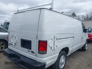 2010 Ford Econoline Cargo Commercial with VIN 1FTNE1EW0ADA90738, listed as a IAAI auction lot 42038940 with 183,195 mi miles and . Bid and sale history available at DreamBid. Image 4.