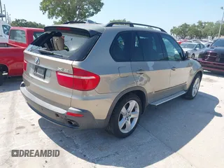 2008 BMW X5 3.0si with VIN 5UXFE43568L024029, listed as a IAAI auction lot 42107247 with 135,607 mi miles. Bid and sale history available at carsss.com. Image 4.