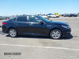 2016 Kia Optima LX with VIN 5XXGT4L32GG038471, listed as a IAAI auction lot 42614892 with 102,781 mi miles and . Bid and sale history available at DreamBid. Image 13.