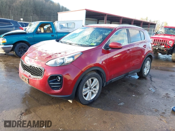 2018 Kia Sportage LX z VIN KNDPMCAC8J7360591, wystawiony jako IAAI lot #38685134 z przebiegiem 95 649 mil mil oraz . Historia ofert i sprzedaży dostępna na DreamBid. Obrazek 2.