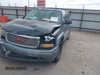 2004 GMC Yukon SLT z VIN 1GKEC13Z44J310511, wystawiony jako IAAI lot #42011475 z przebiegiem 218 746 mil mil oraz . Historia ofert i sprzedaży dostępna na DreamBid. Obrazek 2.
