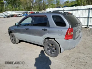 2007 Kia Sportage LX z VIN KNDJE723X77430674, wystawiony jako Copart lot #57050615 z przebiegiem 136 731 mil mil oraz Szkoda całkowita • Salvage title. Historia ofert i sprzedaży dostępna na DreamBid. Obrazek 2.
