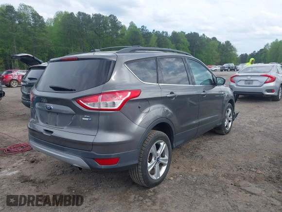 2013 Ford Escape SE with VIN 1FMCU9GX4DUC98328, listed as a IAAI auction lot 41956249 with 114,195 mi miles and . Bid and sale history available at DreamBid. Image 4.