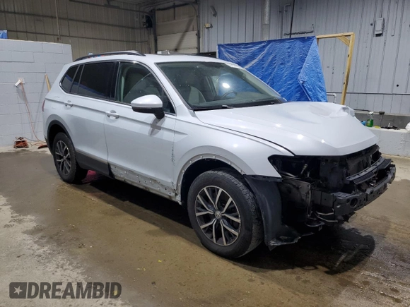 2018 Volkswagen Tiguan SEL with VIN 3VV2B7AX9JM197161, listed as a Copart auction lot 59836195 with 111,195 mi miles and Salvage title. Bid and sale history available at DreamBid. Image 4.