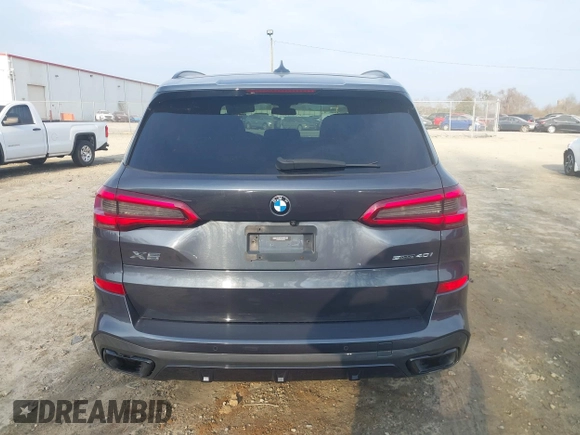 2020 BMW X5 sDrive40i with VIN 5UXCR4C06LLW64438, listed as a IAAI auction lot 41520407 with 89,868 mi miles and . Bid and sale history available at DreamBid. Image 17.