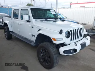 2023 Jeep Gladiator Overland z VIN 1C6HJTFG7PL543870, wystawiony jako IAAI lot #42056969 z przebiegiem 28 655 mil mil oraz . Historia ofert i sprzedaży dostępna na DreamBid. Obrazek 1.