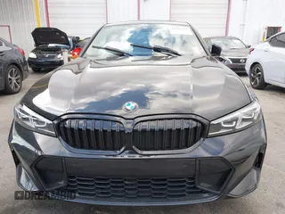 2023 BMW 3 Series 330i with VIN 3MW69FF00P8D17350, listed as a IAAI auction lot 41447178 with 23,372 mi miles. Bid and sale history available at carsss.com. Image 12.