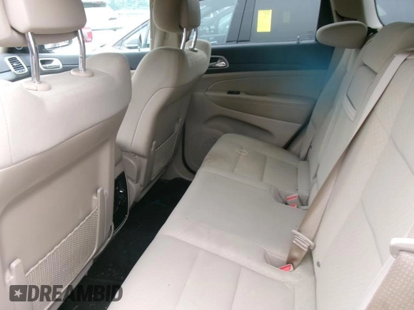 2021 Jeep Grand Cherokee Laredo X with VIN 1C4RJFAG3MC611583, listed as a IAAI auction lot 42631284 with 99,457 mi miles and . Bid and sale history available at DreamBid. Image 8.