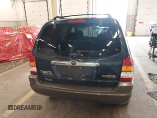 2003 Mazda Tribute LX with VIN 4F2YZ94193KM56345, listed as a IAAI auction lot 41200769 with 141,728 mi miles and . Bid and sale history available at DreamBid. Image 16.