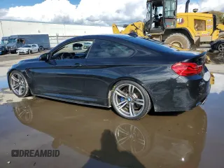 2019 BMW M4 with VIN WBS4Y9C57KAG67209, listed as a Copart auction lot 44204445 with 52,605 mi miles and Salvage Title. Bid and sale history available at carsss.com. Image 2.