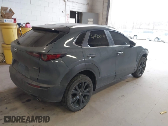 2024 Mazda CX-30 2.5 S Carbon Edition with VIN 3MVDMBCMXRM612697, listed as a IAAI auction lot 41428071 with 28,718 mi miles. Bid and sale history available at carsss.com. Image 4.