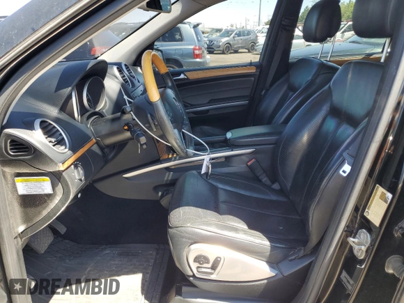 2010 Mercedes-Benz GL-Class GL 550 with VIN 4JGBF8GE1AA561709, listed as a Copart auction lot 65414554 with 156,777 mi miles and Salvage Title. Bid and sale history available at carsss.com. Image 7.