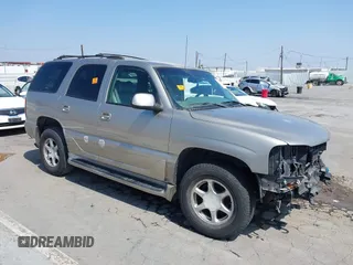 2002 GMC Yukon Denali z VIN 1GKEK63U12J120957, wystawiony jako IAAI lot #42349649 z przebiegiem Nie podano mil oraz . Historia ofert i sprzedaży dostępna na DreamBid. Obrazek 1.