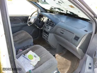 1998 Toyota Sienna LE with VIN 4T3ZF13C1WU052050, listed as a IAAI auction lot 41921780 with 144,769 mi miles. Bid and sale history available at carsss.com. Image 5.