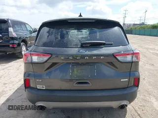 2020 Ford Escape SE z VIN 1FMCU0G61LUB95997, wystawiony jako IAAI lot #42687641 z przebiegiem 80 125 mil mil oraz . Historia ofert i sprzedaży dostępna na DreamBid. Obrazek 16.