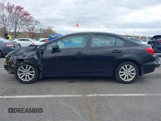 2012 Honda Civic EX with VIN 19XFB2F86CE341668, listed as a IAAI auction lot 42013980 with 187,425 mi miles and . Bid and sale history available at DreamBid. Image 14.