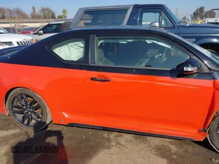 2015 Scion tC with VIN JTKJF5C71FJ006863, listed as a IAAI auction lot 41332681 with 91,559 mi miles. Bid and sale history available at carsss.com. Image 20.