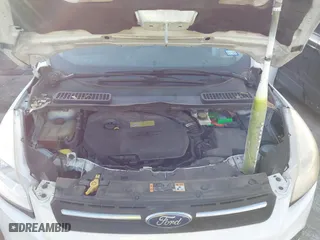 2014 Ford Escape SE with VIN 1FMCU0GX8EUB31399, listed as a IAAI auction lot 41795927 with 129,963 mi miles. Bid and sale history available at carsss.com. Image 10.
