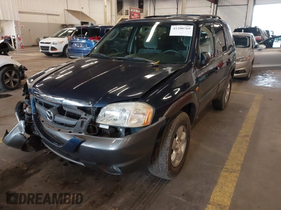 2003 Mazda Tribute LX with VIN 4F2YZ94193KM56345, listed as a IAAI auction lot 41200769 with 141,728 mi miles and . Bid and sale history available at DreamBid. Image 6.