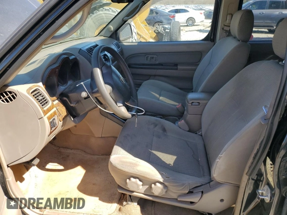 2003 Nissan Frontier XE with VIN 1N6ED27TX3C470638, listed as a Copart auction lot 48197215 with 156,738 mi miles and Clean title. Bid and sale history available at DreamBid. Image 7.