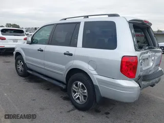 2004 Honda Pilot EX with VIN 2HKYF18644H596075, listed as a IAAI auction lot 41093500 with 92,952 mi miles. Bid and sale history available at carsss.com. Image 3.