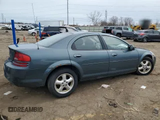 2005 Dodge Stratus SXT z VIN 1B3EL46X25N574295, wystawiony jako Copart lot #51846645 z przebiegiem 135 642 mil mil oraz Czysty tytuł • Clean title. Historia ofert i sprzedaży dostępna na DreamBid. Obrazek 3.