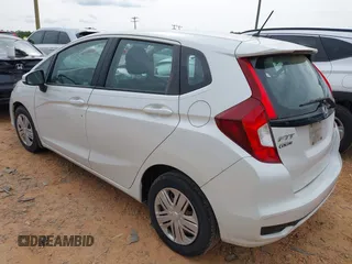 2019 Honda Fit LX z VIN 3HGGK5H4XKM704303, wystawiony jako IAAI lot #42019753 z przebiegiem 137 271 mil mil oraz . Historia ofert i sprzedaży dostępna na DreamBid. Obrazek 3.
