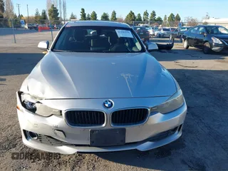 2013 BMW 3 Series 320i with VIN WBA3B1C53DK129703, listed as a IAAI auction lot 41295234 with 175,506 mi miles. Bid and sale history available at carsss.com. Image 11.