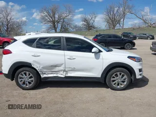 2019 Hyundai Tucson SE with VIN KM8J2CA43KU870933, listed as a IAAI auction lot 41972884 with 53,029 mi miles. Bid and sale history available at carsss.com. Image 14.