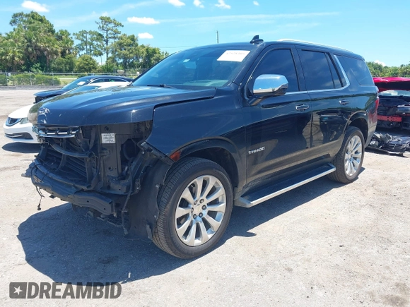 2021 Chevrolet Tahoe Premier with VIN 1GNSKSKDXMR195984, listed as a IAAI auction lot 42528305 with 89,925 mi miles and . Bid and sale history available at DreamBid. Image 18.