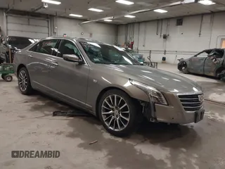 2017 Cadillac CT6 Luxury AWD with VIN 1G6KD5RS8HU140237, listed as a IAAI auction lot 41839506 with 74,721 mi miles and . Bid and sale history available at DreamBid. Image 1.