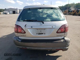 1999 Lexus RX 300 z VIN JT6HF10U0X0059822, wystawiony jako Copart lot #56130615 z przebiegiem 285 100 mil mil oraz Szkoda całkowita • Salvage title. Historia ofert i sprzedaży dostępna na DreamBid. Obrazek 6.