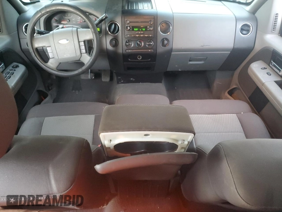 2006 Ford F-150 XLT with VIN 1FTPX04596KB93701, listed as a Copart auction lot 87672425 with 102,128 mi miles and Salvage title. Bid and sale history available at DreamBid. Image 8.