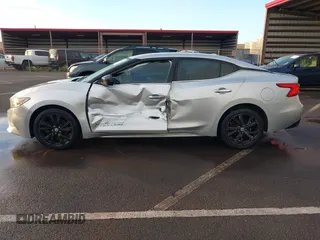 2016 Nissan Maxima S z VIN 1N4AA6AP1GC411633, wystawiony jako IAAI lot #41559508 z przebiegiem 95 240 mil mil oraz . Historia ofert i sprzedaży dostępna na DreamBid. Obrazek 14.
