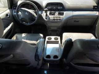 2010 Honda Odyssey EX-L with VIN 5FNRL3H76AB114542, listed as a Copart auction lot 54785425 with 104,239 mi miles and Salvage Title. Bid and sale history available at DreamBid. Image 8.