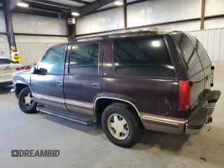 1997 GMC Yukon with VIN 1GKEC13R2VJ734299, listed as a Copart auction lot 74988224 with 225,335 mi miles and Salvage Title. Bid and sale history available at carsss.com. Image 2.