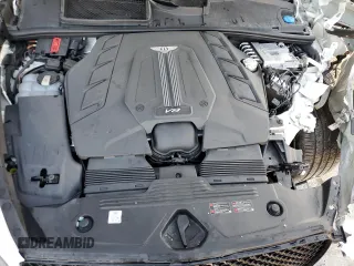 2021 Bentley Bentayga V8 z VIN SJAAM2ZV9MC036858, wystawiony jako Copart lot #41018244 z przebiegiem 29 054 mil mil oraz Nie do naprawy. Historia ofert i sprzedaży dostępna na DreamBid. Obrazek 11.